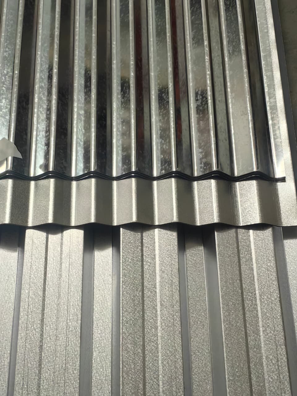 Close-up view of metal roofing sheet profiles